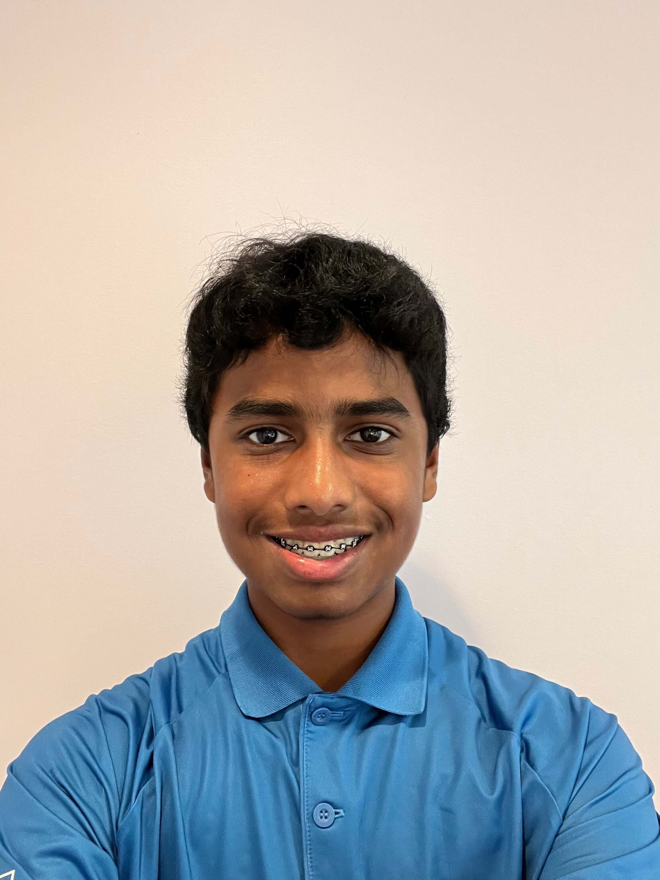 Anshuman Roy A man wearing a blue shirt