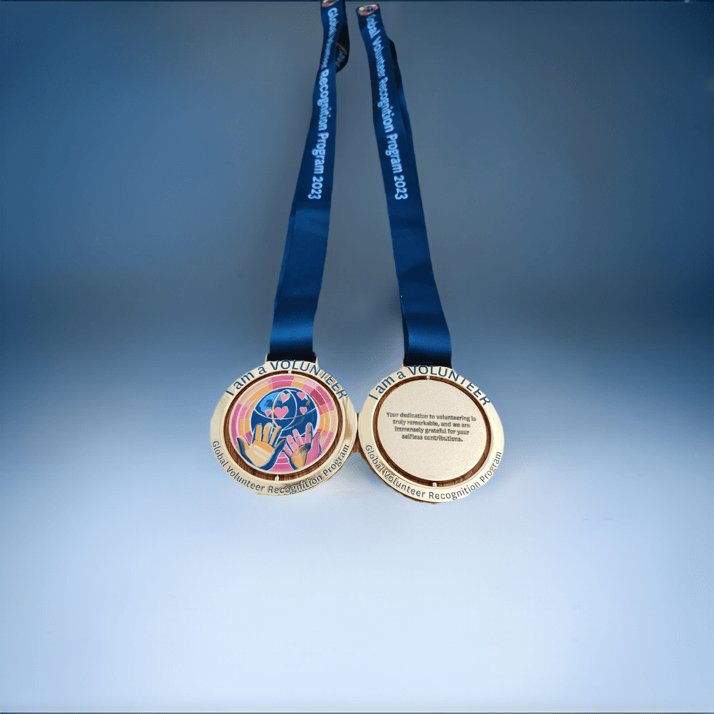 picture of spinning medal. the logo is hands giving love to the world.