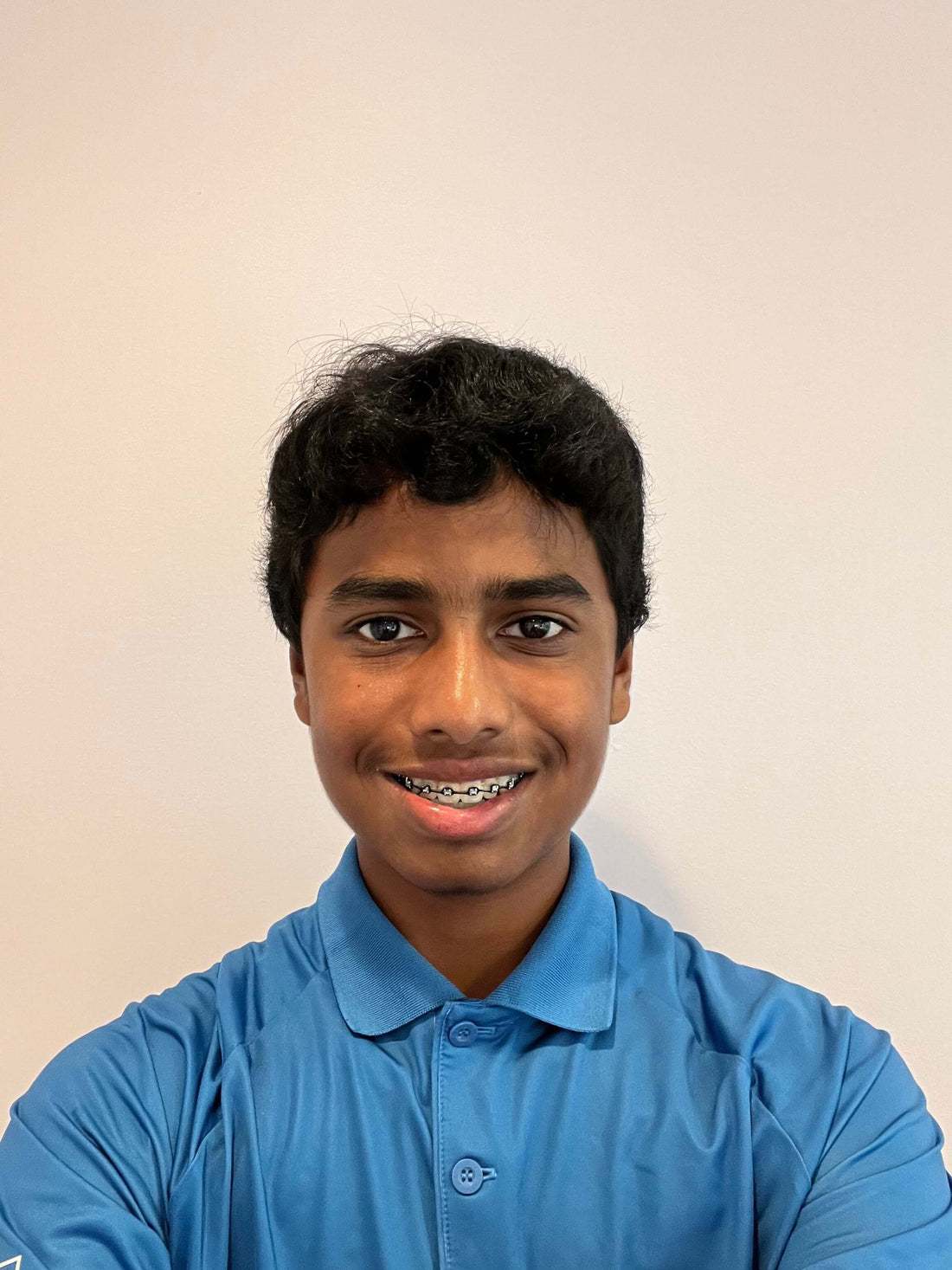 Anshuman Roy A man wearing a blue shirt