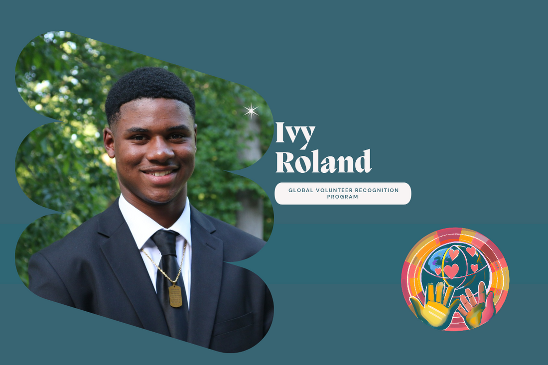 Roland Ivy smiling in a suit and tie outdoors, representing a Criminal Justice student and volunteer.