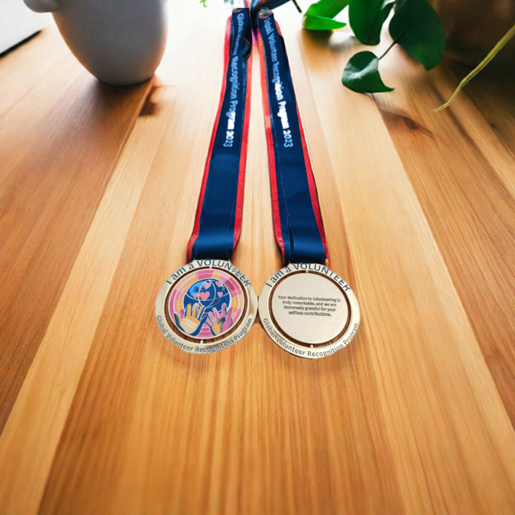 Keepsake picture of spinning medal. the logo is hands giving love to the world.