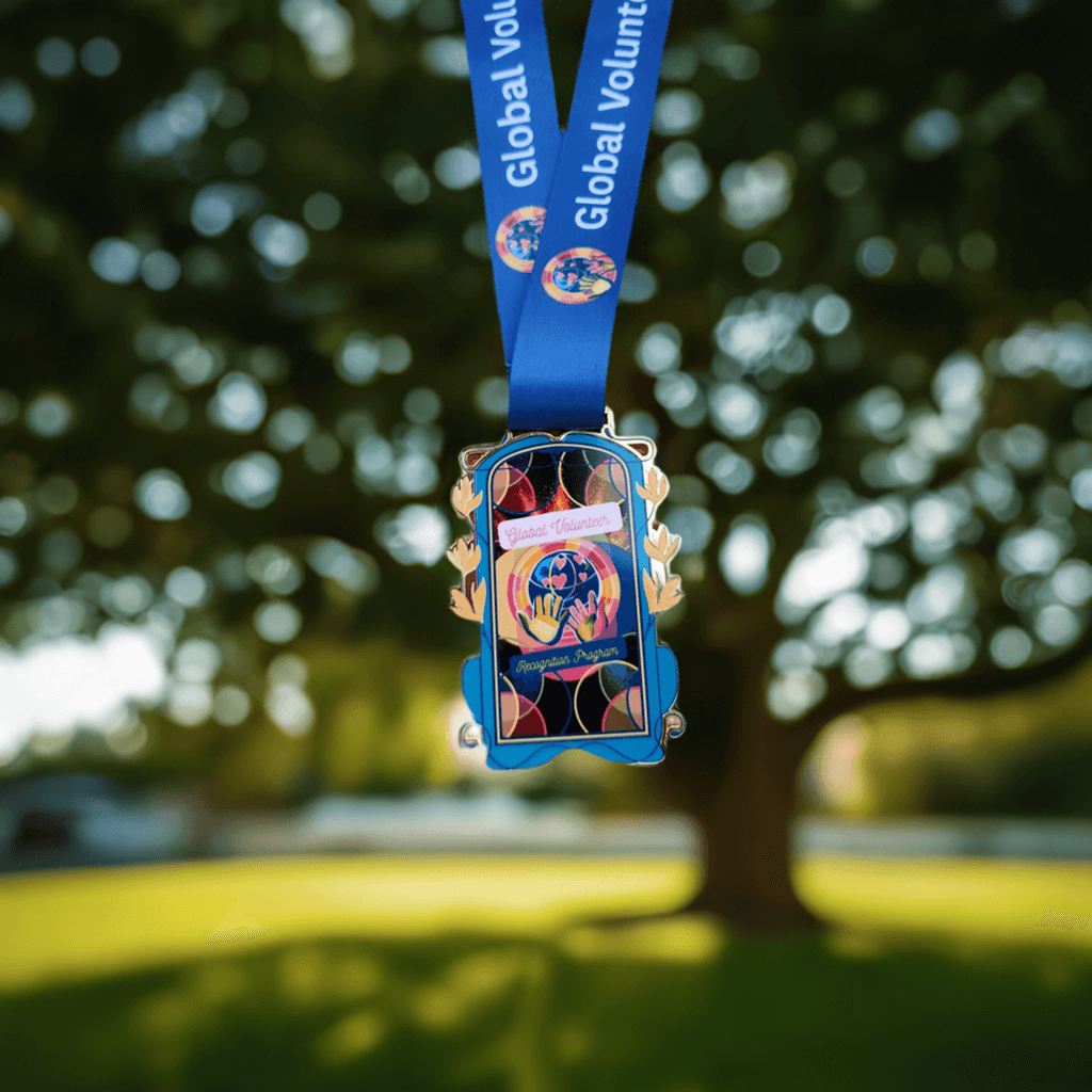 2024 Global Volunteer Recognition Program Membership Blue lanyard with a colorful badge holder 
