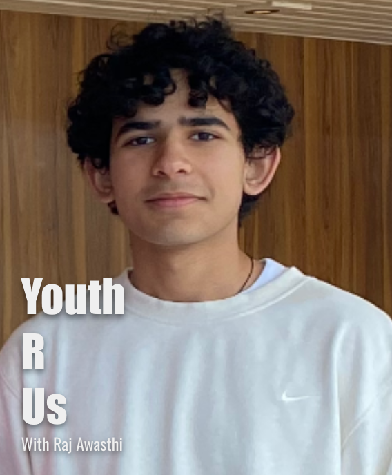 Person wearing a white shirt with 'Youth R Us' text and Nike logo.