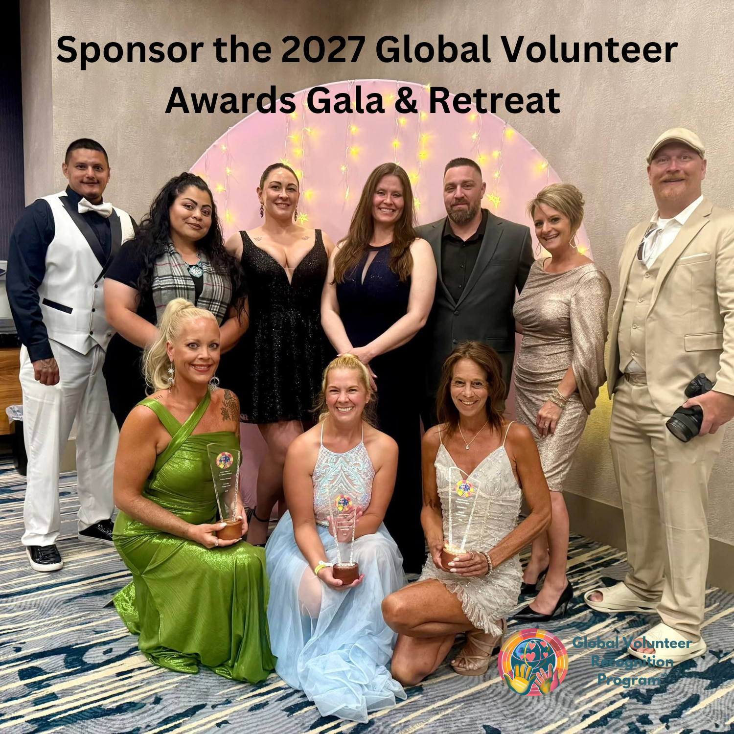 Group of people posing for a photo at an event with text about the 2027 Global Volunteer Awards Gala & Retreat.