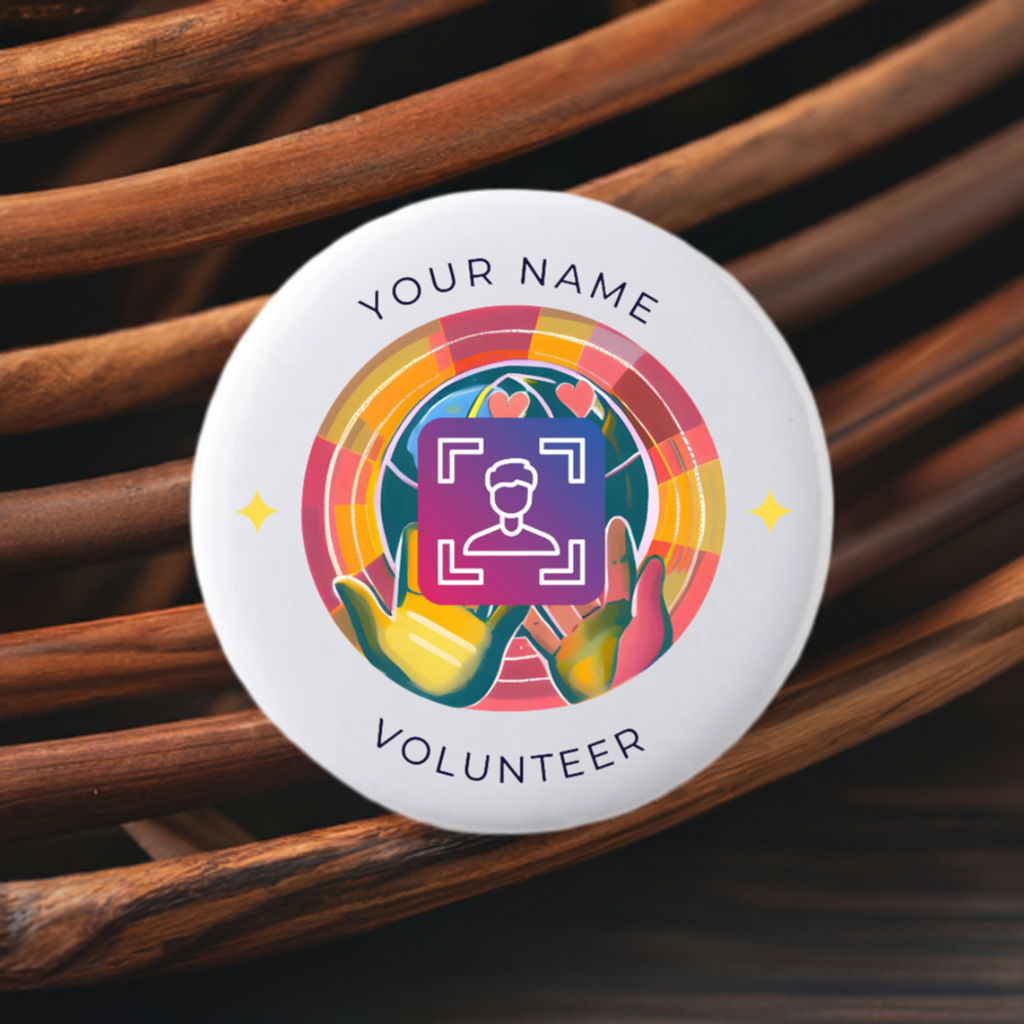 Button badge with colorful design and text 'Your Name Volunteer' on a white background