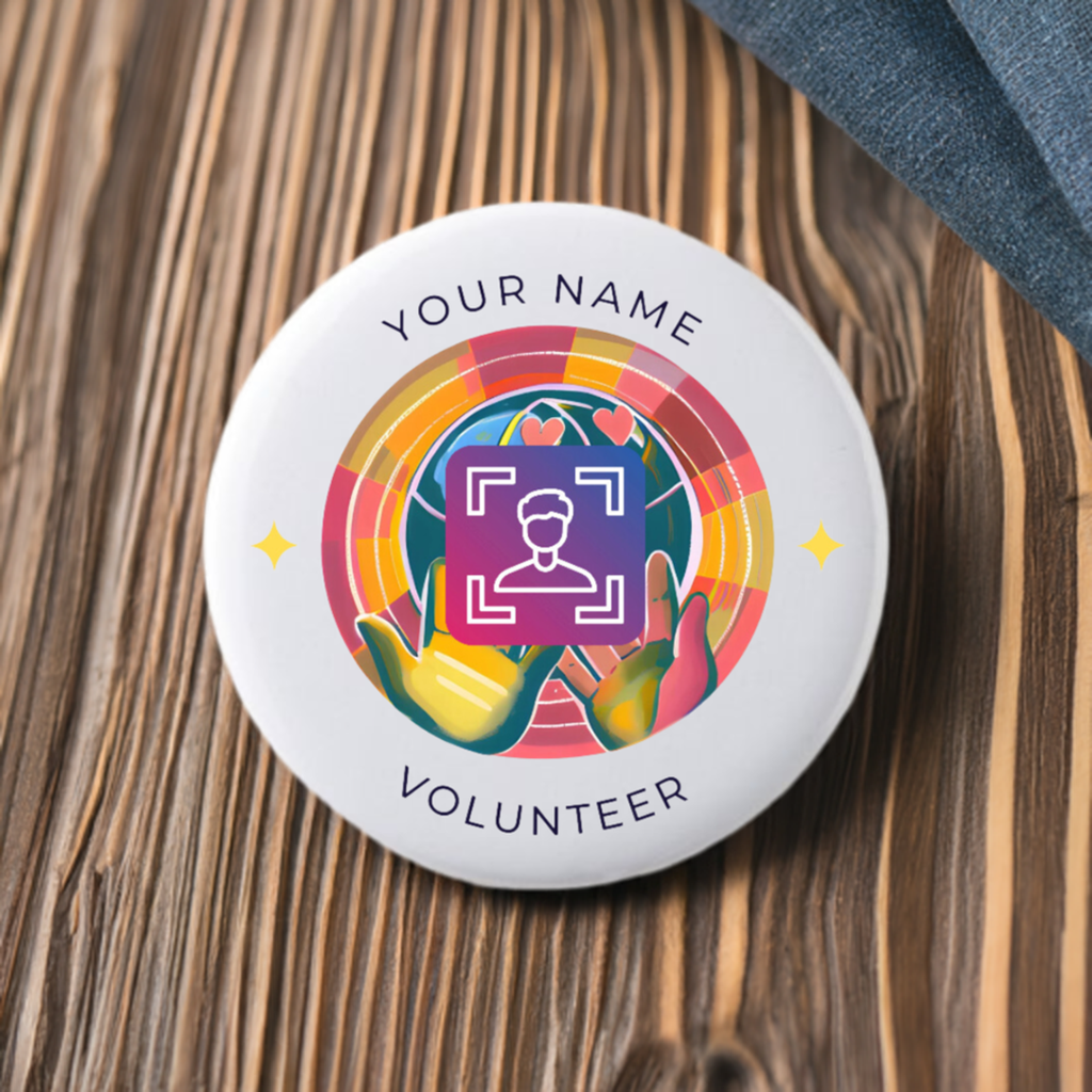Button badge with colorful design and text 'Your Name Volunteer' on a white background
