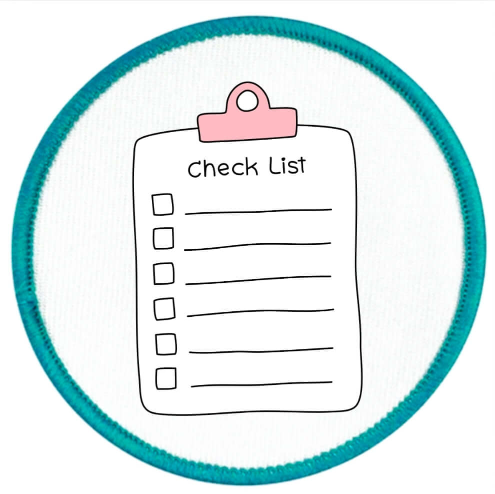 Project Planner Badge Checklist with a pink clip on a white background