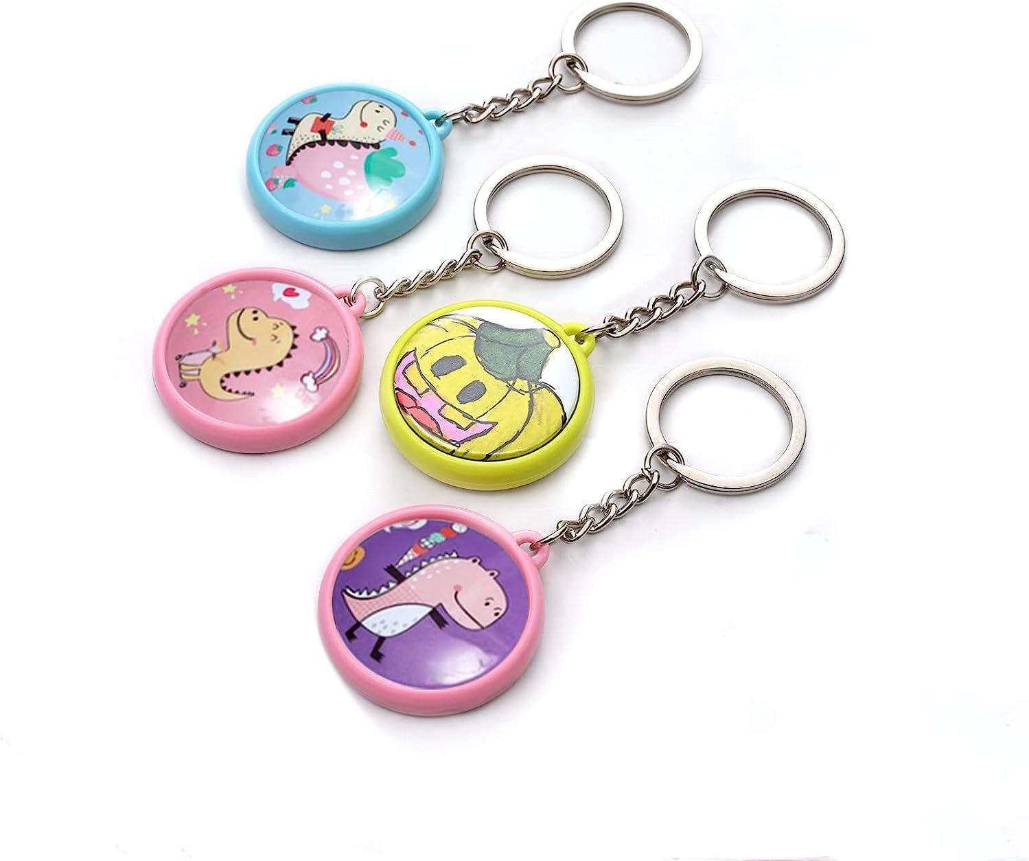Set of colorful keychains with cartoon designs on a white background